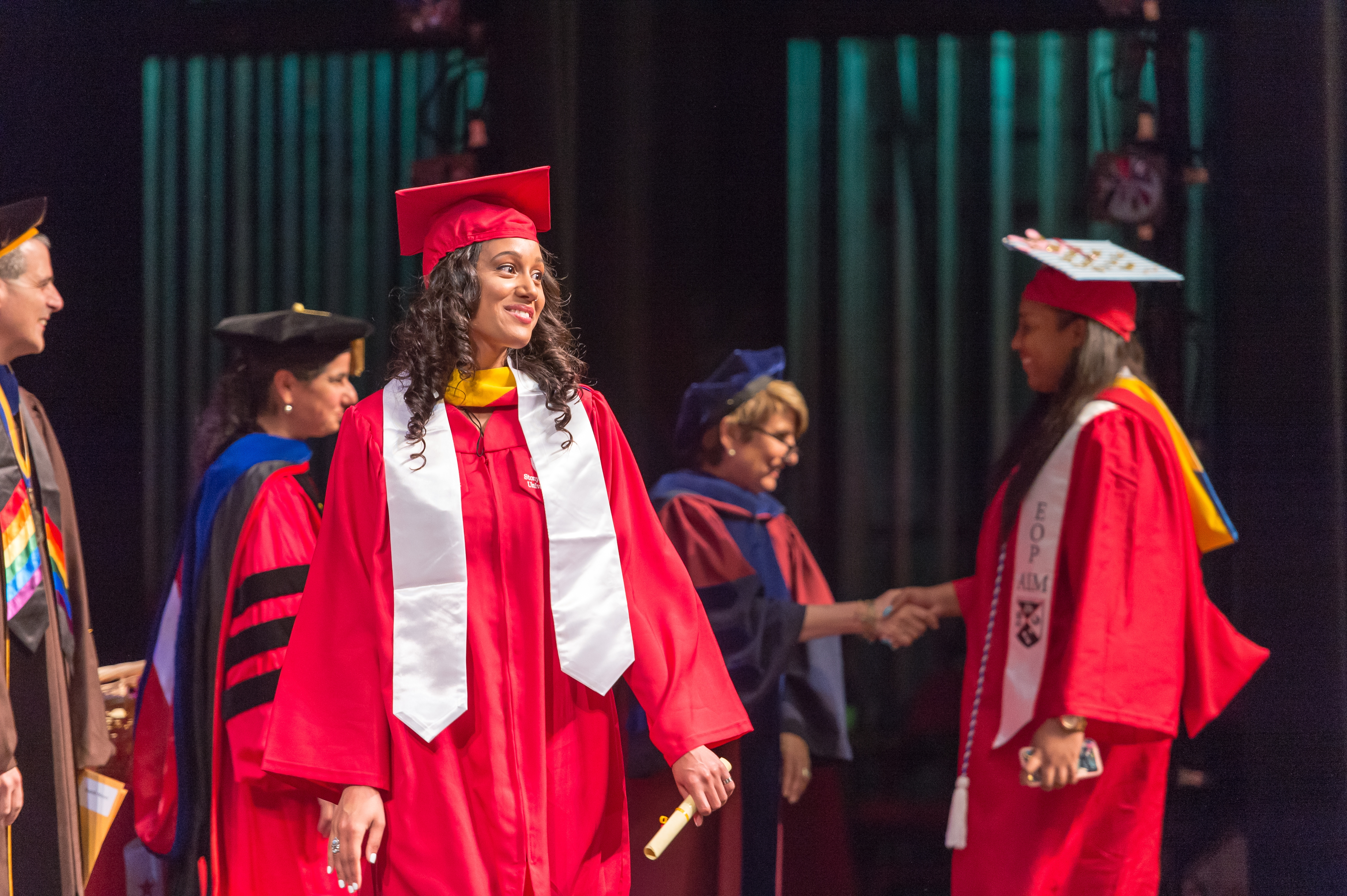 Students at a graduation ceremony.